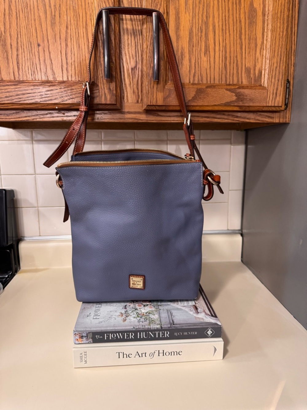 Dooney & Bourke Blue Pebbled Leather Messenger with Brown Trim